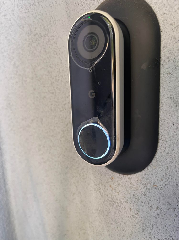 Peeling doorbell (and it's definitely not a protective packaging plastic)